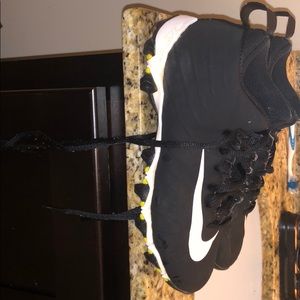 Black and white softball cleats